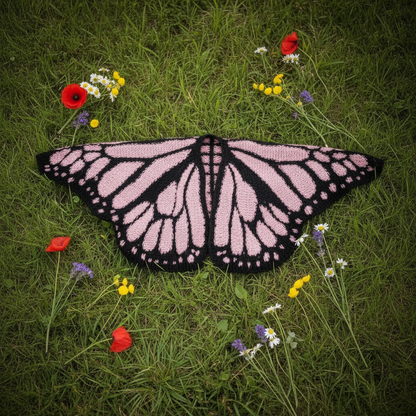 Pink black butterfly wrap on grass