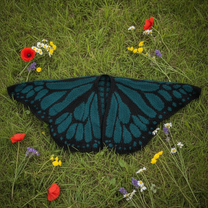Teal butterfly wrap on grass